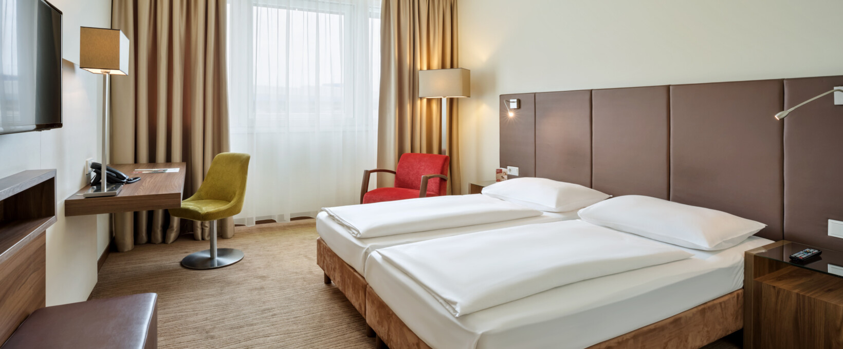 Classic Zimmer | Hotel Doppio in Wien Classic Zimmer mit Twin Bett und Nachttisch | Hotel Doppio in Wien