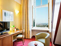 Premium Room living room with stairway | Hotel Schloss Wilhelminenberg in Vienna