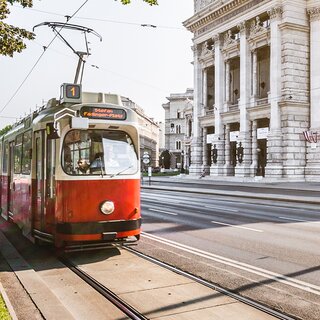Vienna Ring Road with a view of a tram and the Burgtheater