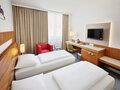 Classic Room with twin bed and desk | Hotel Europa Graz