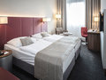 Executive Room with bedroom and desk | Hotel Europa Salzburg