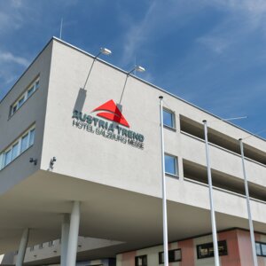Exterior view of hotel building by day| Hotel Salzburg Messe
