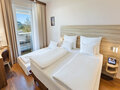 Family Room with living and sleeping area | Hotel Salzburg Messe