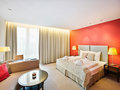 Deluxe Room with living and sleeping area | Hotel Savoyen Vienna