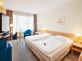 Classic Zimmer mit Kingsize Bett| Hotel Schillerpark in Linz