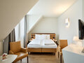 Superior Room with twin beds and desk | Hotel Theresianum in Vienna